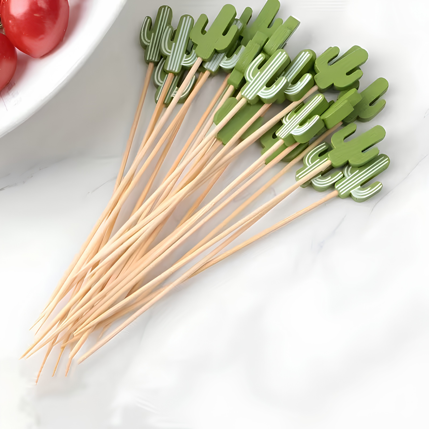 36-piece set features decorative bamboo food picks with green cactus-shaped tops